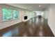 Bright open floor plan featuring hardwood floors and a fireplace at 1892 Mercedes Ne Ct, Atlanta, GA 30345