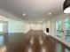 Spacious living room with fireplace and French doors leading to deck at 1892 Mercedes Ne Ct, Atlanta, GA 30345