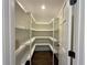 Well-organized pantry with custom shelving for ample storage at 1892 Mercedes Ne Ct, Atlanta, GA 30345