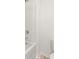Bathroom featuring shower over tub and standard toilet at 25 Amberjack Trl, Covington, GA 30016
