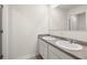 Bathroom featuring double sink vanity and a large mirror at 25 Amberjack Trl, Covington, GA 30016