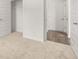 Bedroom features a closet, neutral walls, and carpet at 25 Amberjack Trl, Covington, GA 30016