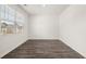 Bedroom with hardwood floors, and a large window with bright natural light at 25 Amberjack Trl, Covington, GA 30016