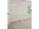 Bright bedroom with large window and neutral carpet at 25 Amberjack Trl, Covington, GA 30016