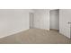 Bedroom with ensuite bathroom access and large closet at 25 Amberjack Trl, Covington, GA 30016