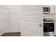 Contemporary kitchen offers a spacious pantry and stainless steel appliances at 25 Amberjack Trl, Covington, GA 30016