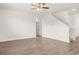Spacious living room with hardwood floors and staircase at 25 Amberjack Trl, Covington, GA 30016