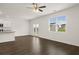 A spacious living room with wood floors and lots of natural light at 25 Amberjack Trl, Covington, GA 30016