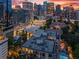 Nighttime aerial view of the city with building lights and pool at 905 Juniper Ne St # 808, Atlanta, GA 30309