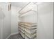 Walk-in closet with custom organization system including drawers, shelves, and hanging rods for efficient storage at 905 Juniper Ne St # 808, Atlanta, GA 30309