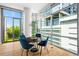 Modern dining room with floor-to-ceiling windows and an open layout at 905 Juniper Ne St # 808, Atlanta, GA 30309