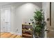 Hallway entryway features modern decor with hardwood floors, accent shelving, and elegant lighting at 905 Juniper Ne St # 808, Atlanta, GA 30309