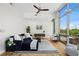 Bright living room with floor-to-ceiling windows and neutral decor at 905 Juniper Ne St # 808, Atlanta, GA 30309