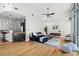 Spacious living room with hardwood floors next to an eat-in kitchen area at 905 Juniper Ne St # 808, Atlanta, GA 30309