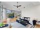 Spacious living room with hardwood floors, modern furnishings, and large windows providing plenty of natural light at 905 Juniper Ne St # 808, Atlanta, GA 30309