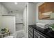 Stylish bathroom boasting a tiled shower, sleek vanity, and coordinated decor for a spa-like experience at 130 26Th Nw St # 415, Atlanta, GA 30309