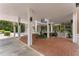 Well-maintained building entrance with covered parking and mature landscaping at 130 26Th Nw St # 415, Atlanta, GA 30309
