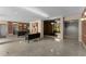 Lobby area showcasing modern seating, mirrored walls, and elevator access, offering a stylish welcome at 130 26Th Nw St # 415, Atlanta, GA 30309