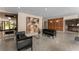 Inviting lobby with a seating area featuring contemporary artwork and terrazzo flooring at 130 26Th Nw St # 415, Atlanta, GA 30309