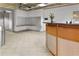 Modern reception area with mailboxes, wooden desk, and tiled flooring at 130 26Th Nw St # 415, Atlanta, GA 30309
