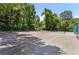 Well-maintained community tennis court surrounded by lush greenery at 130 26Th Nw St # 415, Atlanta, GA 30309