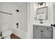 Bathroom featuring a gray vanity, new fixtures, and shower-tub combo at 1645 Cobbs Creek Ln, Decatur, GA 30032