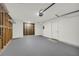 Spacious garage with ample storage and door to interior at 1645 Cobbs Creek Ln, Decatur, GA 30032