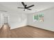 Spacious, airy bonus room with wood-look flooring and modern ceiling fan at 1645 Cobbs Creek Ln, Decatur, GA 30032