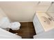 Cozy bathroom featuring a sink with a vanity and a toilet at 1805 Ashborough Se Cir # H, Marietta, GA 30067