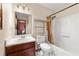 Bathroom featuring standard fixtures and a shower-tub combination at 273 Hardwood Ln, Lawrenceville, GA 30044