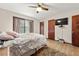 Bedroom with a view outside, with ceiling fan at 273 Hardwood Ln, Lawrenceville, GA 30044