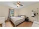 Well-lit bedroom featuring a window and furnishings at 273 Hardwood Ln, Lawrenceville, GA 30044