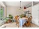 Dining area features lots of natural light with dining table set up with chairs at 273 Hardwood Ln, Lawrenceville, GA 30044