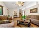 Spacious living room with hardwood floors, and comfortable seating at 273 Hardwood Ln, Lawrenceville, GA 30044