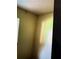 A room with bare walls and a ceiling that needs work at 401 Camelot Dr, Atlanta, GA 30349