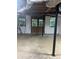 Unfinished basement with windows and double door access to outside at 618 Old Doss Dr, Canton, GA 30115