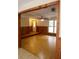 Open-concept living area featuring hardwood floors and a ceiling fan at 618 Old Doss Dr, Canton, GA 30115