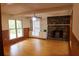 Cozy living room with stone fireplace and built-in shelves at 618 Old Doss Dr, Canton, GA 30115