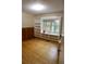 Office space features built in shelving and hardwood floors and outside views at 618 Old Doss Dr, Canton, GA 30115