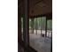 Screened porch featuring views of the backyard and nature at 618 Old Doss Dr, Canton, GA 30115
