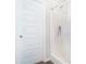 Bathroom featuring a tiled shower with a clear curtain at 741 Jackson Ct, Social Circle, GA 30025