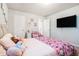 bedroom with a television, desk and cute Hello Kitty wall decor at 741 Jackson Ct, Social Circle, GA 30025