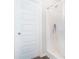 Bright shower stall with a white shower curtain at 741 Jackson Ct, Social Circle, GA 30025