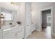 Elegant bathroom with double vanity, marble countertops, and modern fixtures at 2003 Haley Walk, Woodstock, GA 30188