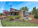 Welcoming community entrance with lush landscaping and clear signage under a bright blue sky at 2003 Haley Walk, Woodstock, GA 30188