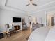 Spacious main bedroom features a fireplace, tray ceilings, and hardwood flooring at 2003 Haley Walk, Woodstock, GA 30188