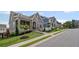 A beautiful home set within a well-maintained neighborhood, complemented by sidewalks and green spaces at 2003 Haley Walk, Woodstock, GA 30188