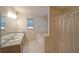 Bathroom featuring a tub, shower, and vanity sink at 251 Lambeth Dr, Hiram, GA 30141