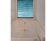 Close up on a soaking tub with tile surround and a window at 251 Lambeth Dr, Hiram, GA 30141