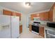 Functional kitchen featuring wood cabinets and standard appliances at 251 Lambeth Dr, Hiram, GA 30141